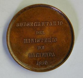 Medalla conmemorativa del nombramiento de Cos-Gayón como subsecretario del Ministerio de Hacienda