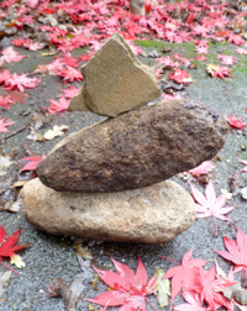 Balancing Rocks: A Wobbly Game