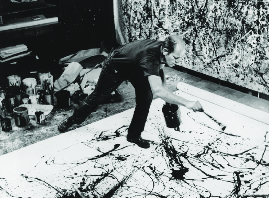 Jackson Pollock pinta utilizando la técnica del dripping, en su estudio